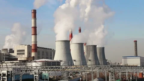Smoke stacks at coal burning power plant Stock Footage 89425175