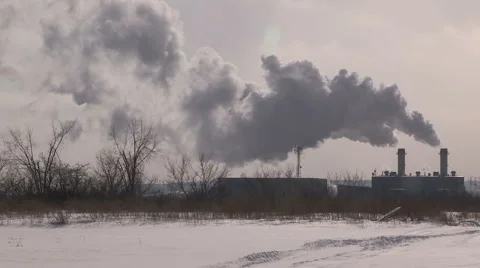 Smoke stacks from industry belching carbon and gases into the environment Stock Footage 47220035