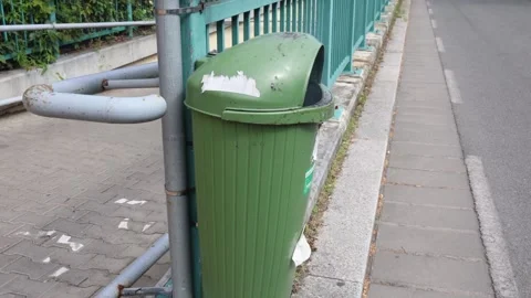 Smoke from street trash container Видео 336927724