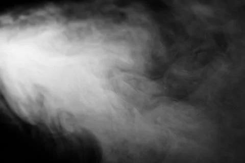 Smoke texture or pattern in the air , bright light effect realistic at dark b Фото