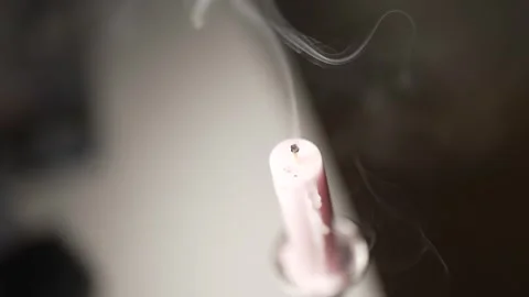 Smoke trailing from extinguished candle, Stock Footage 253205895