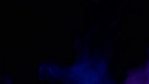 Smoke from Ultrasonic Aroma Diffuser and colorful light on black background. Stock Footage 225057773