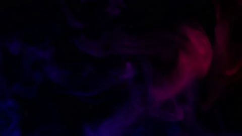 Smoke from Ultrasonic Aroma Diffuser and colorful light on black background. Stock Footage 225057781