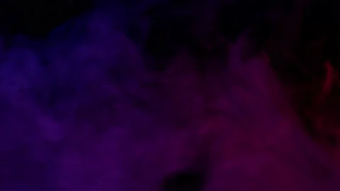 Smoke from Ultrasonic Aroma Diffuser and colorful light on black background. Stock Footage 225057790