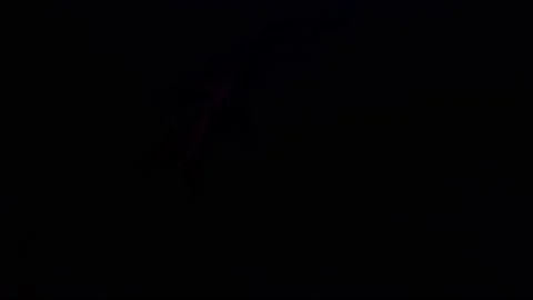 Smoke from Ultrasonic Aroma Diffuser and colorful light on black background. Stock Footage 225057898