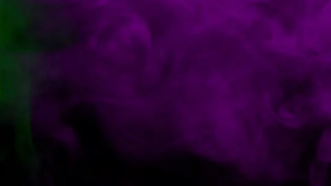 Smoke from Ultrasonic Aroma Diffuser and colorful light on black background. Stock Footage 238749016