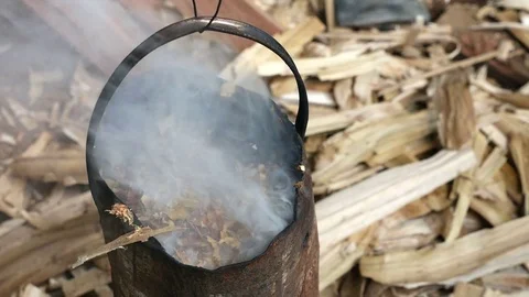 Smoke from wood burning for keep mosquitoes and annoying bugs away. Stock Footage