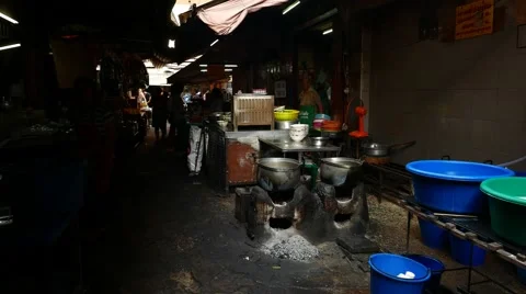 Smoked and dirty outdoor kitchen at small dark passage, large pan at brazier 스톡 동영상 53131053