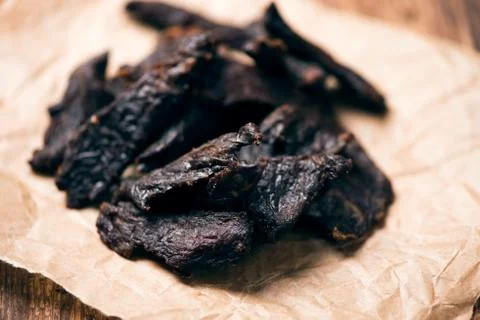 Smoked beef jerky on on a table Stock Photos