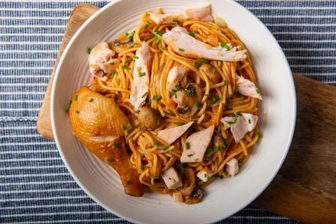 Smoked chicken with spaghetti and chives Stock Photos
