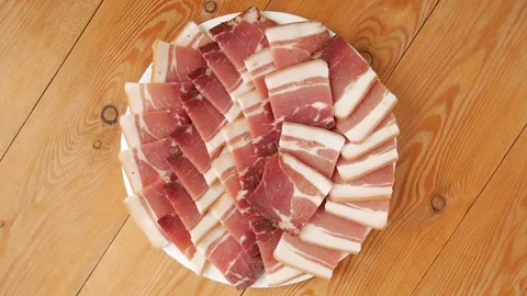 Smoked cured ham on a plate. Video stock 243474853