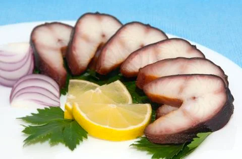 Smoked eel steaks Stock Photos