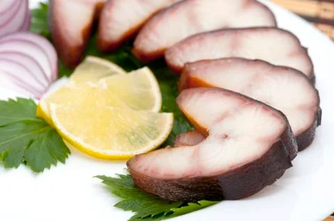 Smoked eel steaks Stock Photos