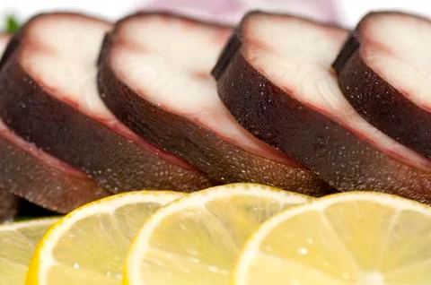 Smoked eel steaks Stock Photos
