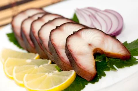 Smoked eel steaks Stock Photos