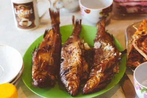 Smoked fish on the table Stock Photos