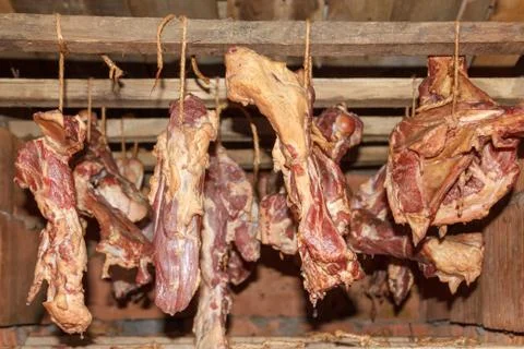 Smoked ham bacon and bones hanging Stock Photos