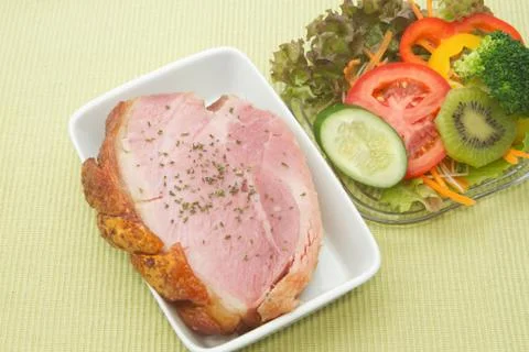 Smoked ham stack with fruit and vegetable salad Stock Photos