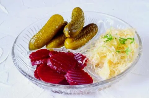 Smoked mackerel, pickled cucumbers, beetroot, sauerkraut, french fries Foto stock