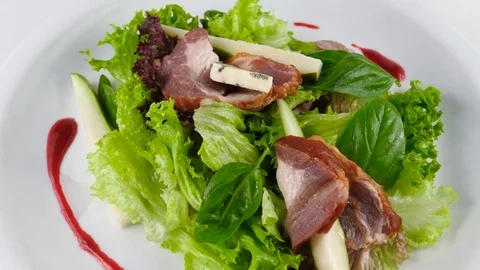 Smoked meat or ham salad, served with Roquefort cheese and sliced pear Stock Footage 81002000