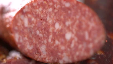Smoked meat stick on the table Vídeo Stock 100732632