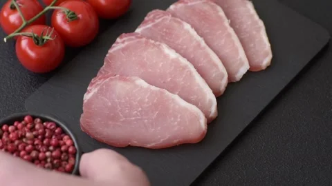 Smoked or dry cured meat slices, pork or ham with salt and spices. Smoked meat s Stock Footage 333073235