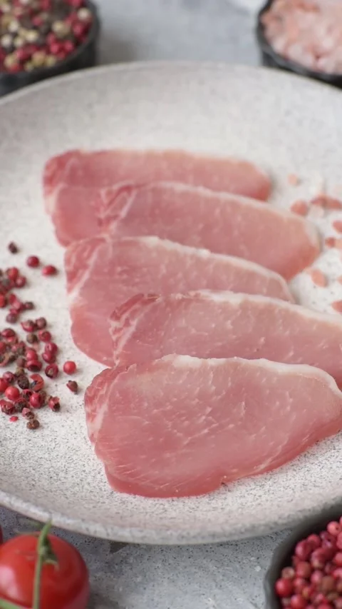 Smoked or dry cured meat slices, pork or ham with salt and spices. Smoked meat s Stock Footage 333073237