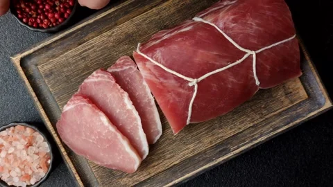 Smoked or dry cured meat slices, pork or ham with salt and spices. Smoked meat s Stock Footage 333073270