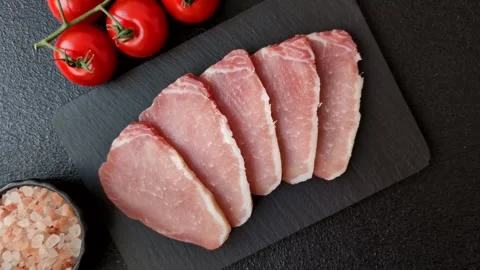 Smoked or dry cured meat slices, pork or ham with salt and spices. Smoked meat s Stock Footage 333073298