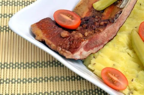 Smoked rib with mashed potato Stock Photos