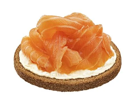 Smoked salmon on rye bread slice isolated on white background Foto stock