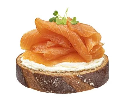Smoked salmon on rye bread slice isolated on white background with clipping path Stock Photos