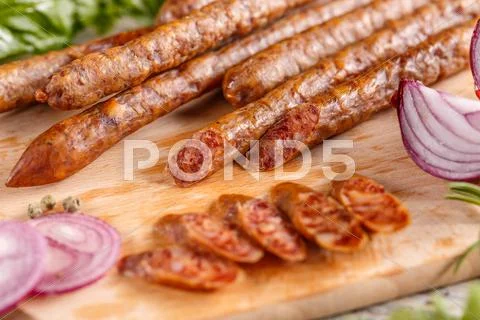 Smoked thin sausage salami Stock Photos