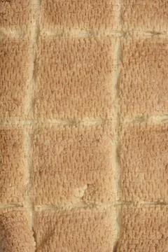 Smoked tofu surface texture with grid patterns Stock Photos