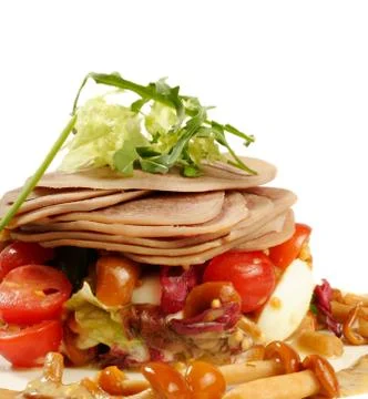 Smoked tongue served with muchrooms and tomatos isolated on white Stock Photos