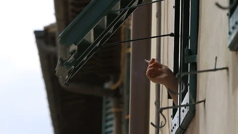 Smoker at the window Stock Footage 103058245