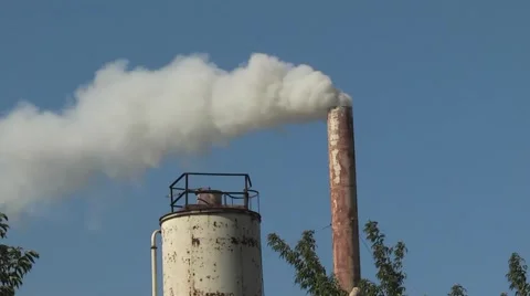Smokes a pipe factory Stock Footage 959154