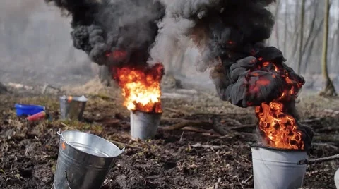 Smokescreen bomb in the bucket Stock Footage 57670911
