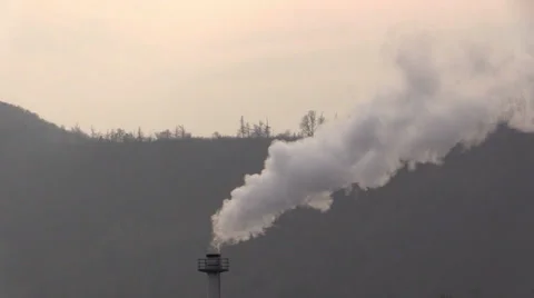 Smokestack against a forest Stock Footage 36254578
