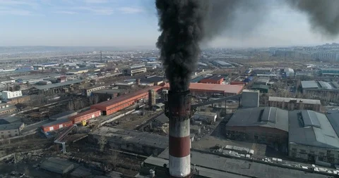 Smokestack emissions black smoke coming from chimney of coal-fired plant Stock Footage
