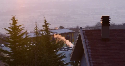 Smokestack on rooftop Stock Footage 89974154