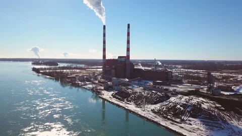 Smokestacks by River and Bridge 07 Stock Footage 108460993