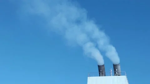 Smokestacks towards a blue sky Stock Footage 202265758