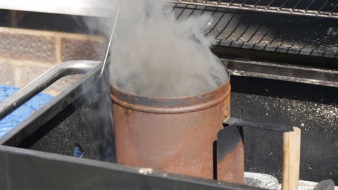 A smoking BBQ chimney 動画素材 115054528