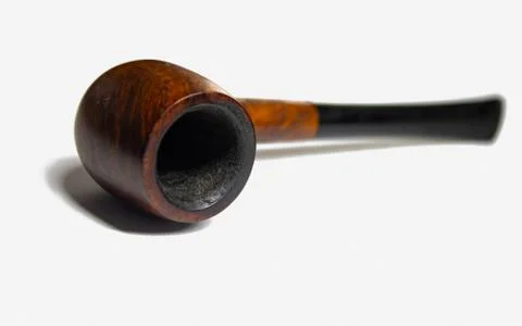 Smoking briar pipe, on a white background Stock Photos