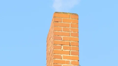 Smoking brick chimney, blue sky Stock Footage 124407586