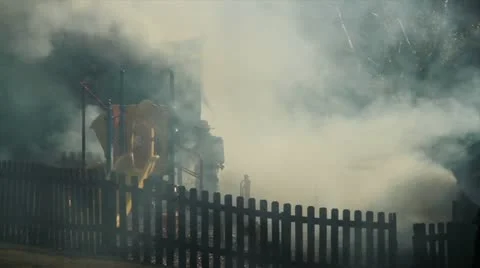 Smoking building on fire Stock Footage 22196200