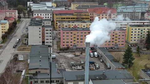 Smoking chimney at the spring time in Estonia 動画素材 245860293