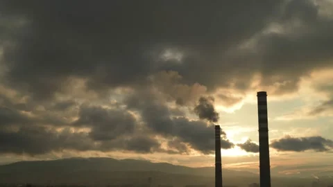 Smoking chimney at sunset, time lapse. Stock Footage 219716078