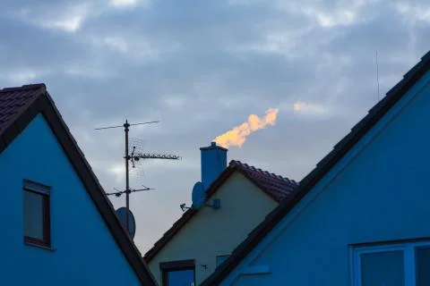 Smoking chimney in winter Stock Photos